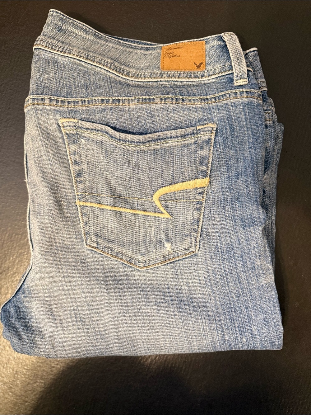 American Eagle Outfitters Light Blue Flare Jeans with Yellow Stitch